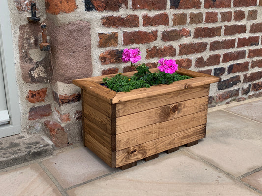 Charming Wooden Trough Planters for Timeless Garden Beauty